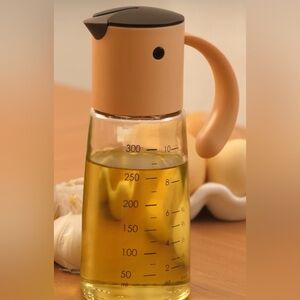 NIB Vucchini Gravity Oil & Vinegar Dispenser, Award Winning!!